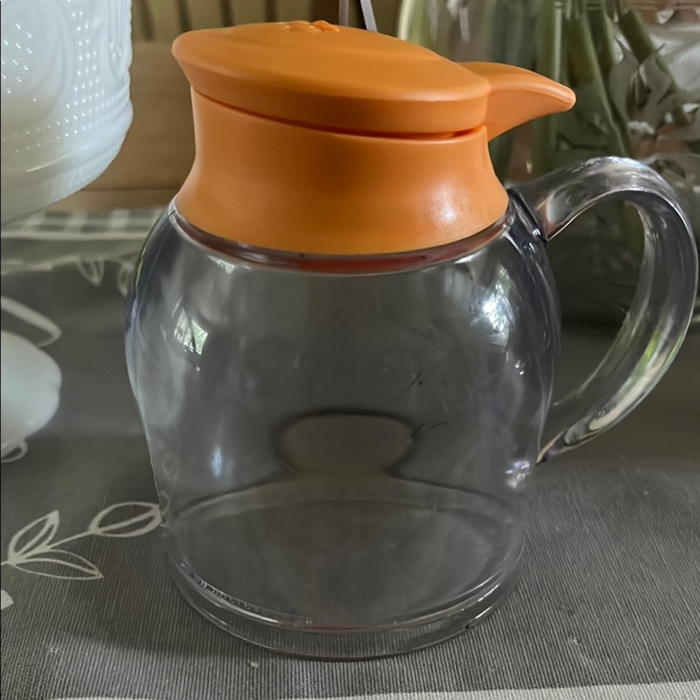 Clear Plastic Syrup Dispenser with Orange Lid